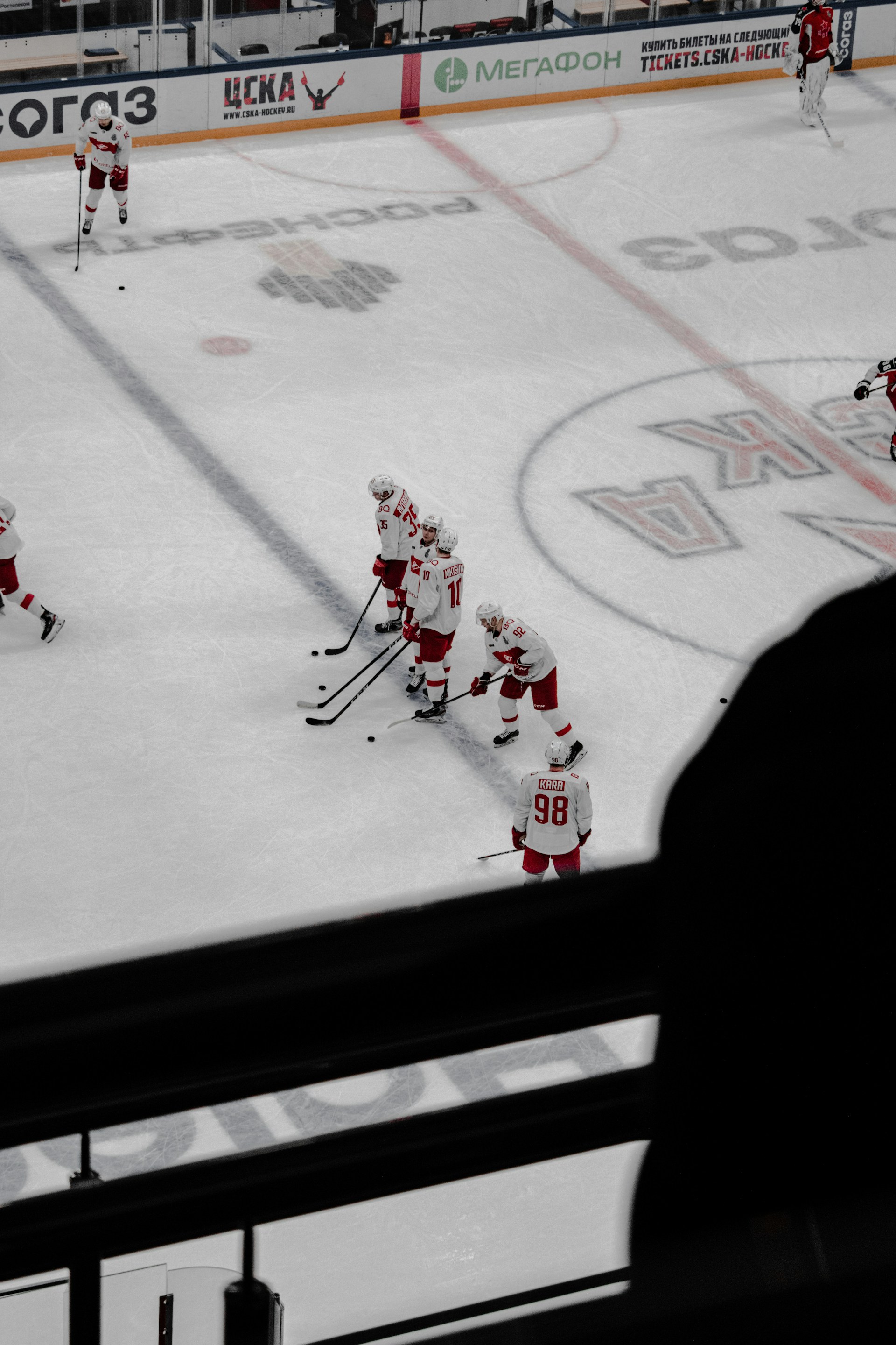 Hockey player racing across the ice with the puck